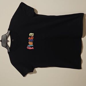 FIESTA This is literally a party shirt Black cap sleeves Graphic Tee Sz. M/L